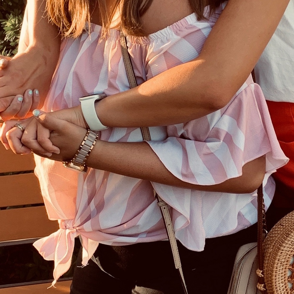 While/pink off shoulder top